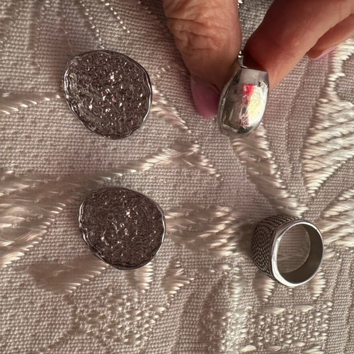 Steel rings and earrings set like new, 4 pieces