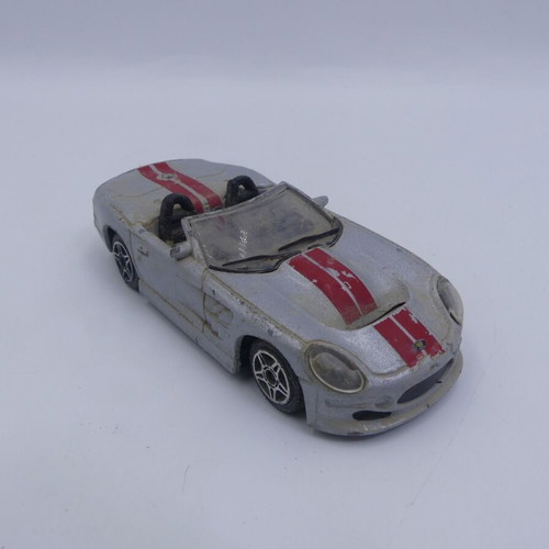 Ford Shelby Series 1 Burago Street Fire 1/43 used, silver with red stripes