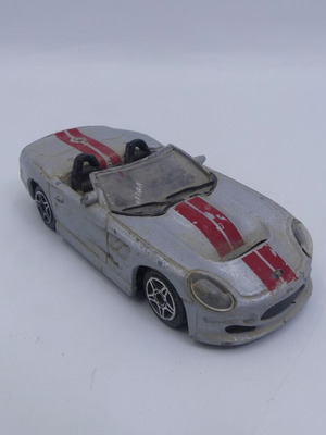 Ford Shelby Series 1 Burago Street Fire 1/43 used, silver with red stripes