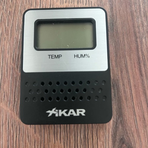 Cigar accessories like new with cedar humidifier, Colibri cutter and Xikar hygrometer