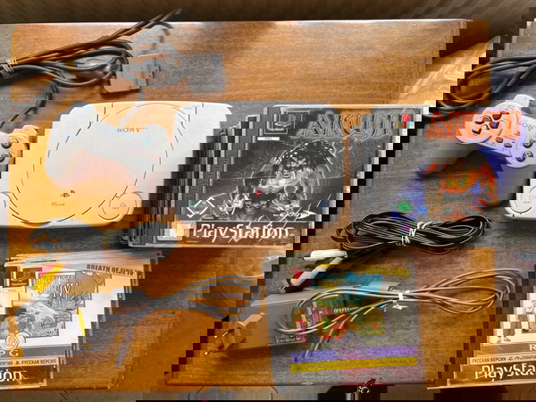Sony PlayStation 1 slim + 18 games + cables + 1 controller