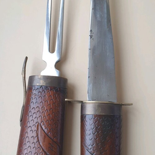 Vintage barbecue set used with knife and fork in wooden sheath