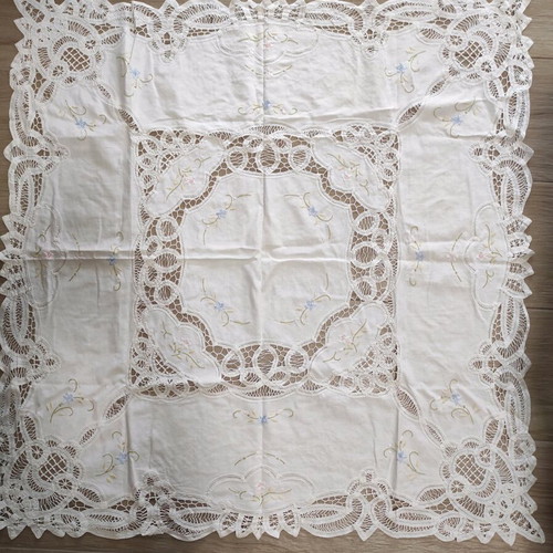 Small tablecloth used, white with lace and flowers