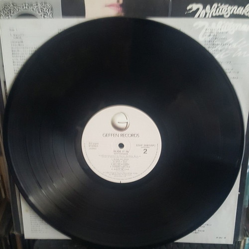 Whitesnake Slide It In Japanese LP 1984 used, signed by David Coverdale