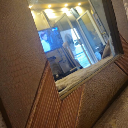 Wooden mirror used with leather decorative details, 51x76 cm