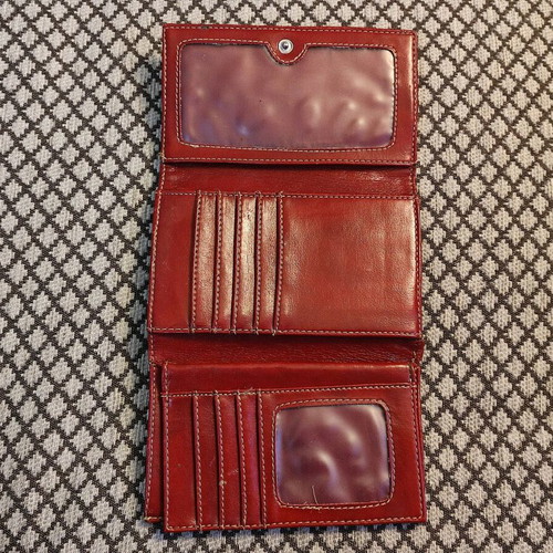 Red wallet used with multiple compartments
