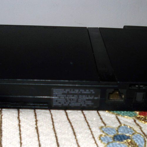 Sony PlayStation 2 Slim SCPH-70004 console bundle with controller and games