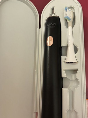 Electric toothbrush used with new replacement head