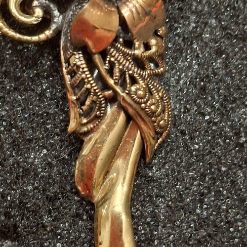 Vintage 90s mask brooch with flower used, bronze tone