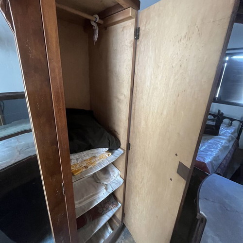 Wooden wardrobe used, three-door with mirror and shelves, antique
