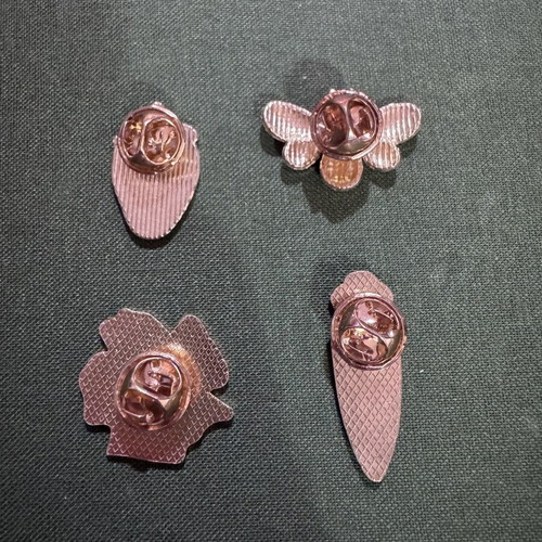 Metal pins set of 4 new