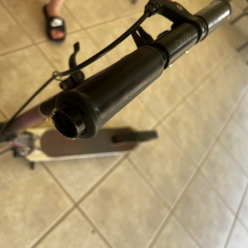 Oxelo Mid 9 pink scooter used, grip worn