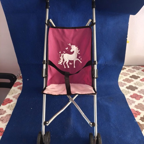 Toy stroller like new, lightweight and foldable