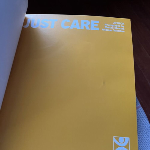 Just Care Photobook like new, bilingual Greek and English