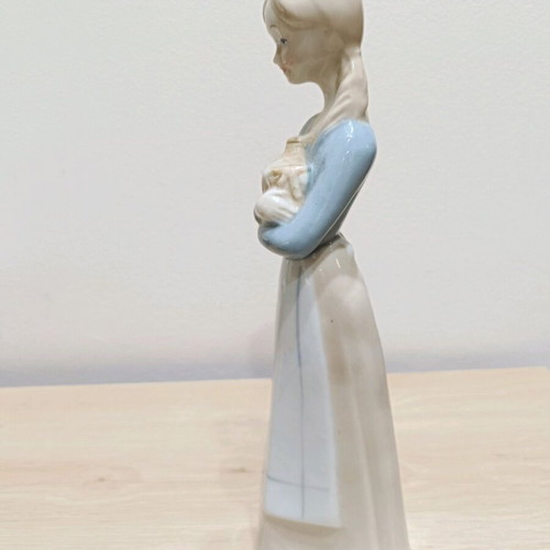 Porcelain figure of young woman like new, height 29 cm
