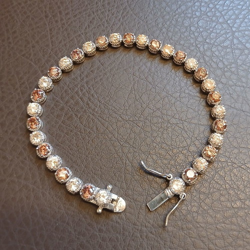 Silver Riviera jewelry set 925 with honey shade zirconia, bracelet and ring