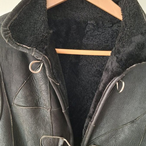 Leather sleeveless vest black with fur lining like new