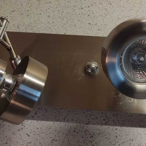 Ceiling light used with adjustable spotlights