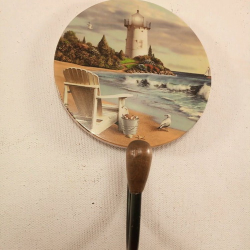 Metal hanger with wooden frame featuring lighthouse beach theme, new