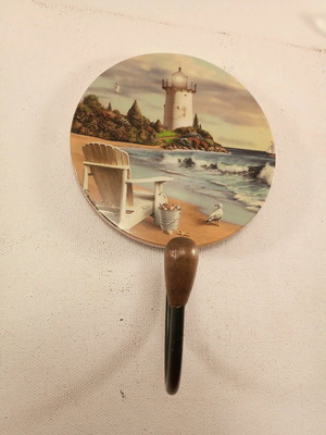 Metal hanger with wooden frame featuring lighthouse beach theme, new