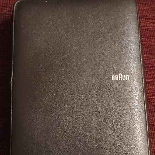 Vintage Braun electric shaver used with case and extra device
