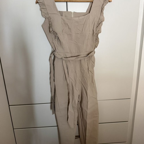 Jumpsuit with ruffles beige, one size, like new