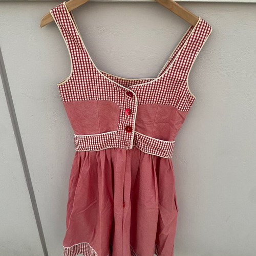 Dress small red used with checkered pattern and strawberries