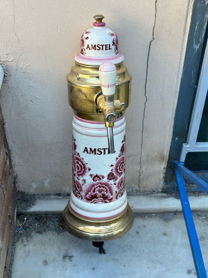 Ceramic Amstel beer tower used, dimensions 64x20.5 cm