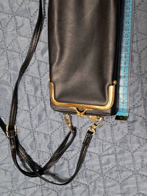 Small black crossbody bag like new with gold details