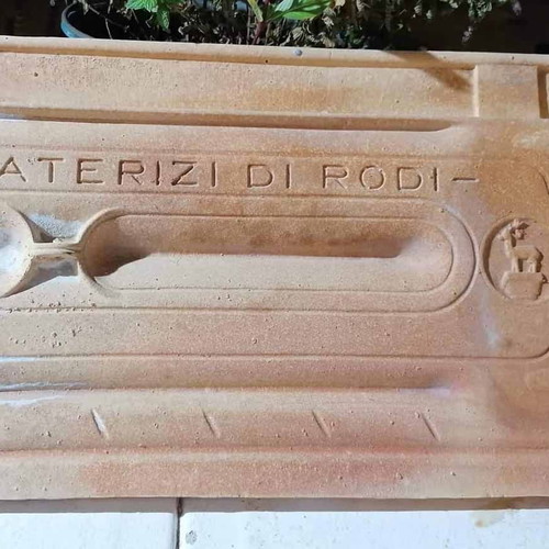 Ceramic roof tile used with ''Laterizi di Rodi'' mark and deer