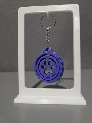 3D printed rotating paw keychain spinner like new