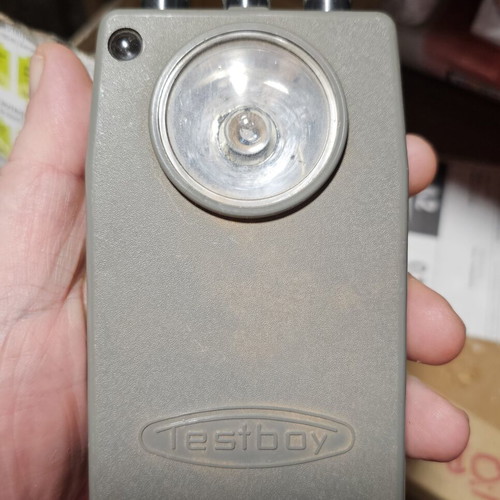 Vintage DDR electrical tool shaped like a flashlight used