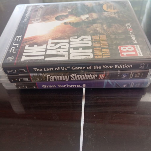 PS3 game bundle with The Last of Us, Farming Simulator 15, Gran Turismo 6