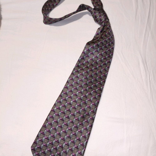 Vogue silk tie used with geometric pattern in brown and purple