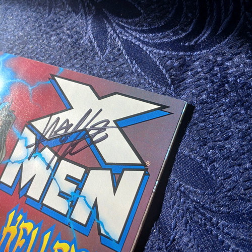 X-Men #62 like new with Carlos Pacheco signature