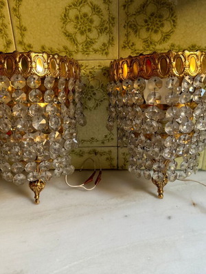 Wall lights used with crystals and gold decoration