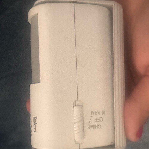Motion sensor like new with alarm and square battery