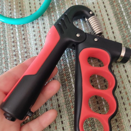 Fitness tools set of 2 used, hand grip and stretching band