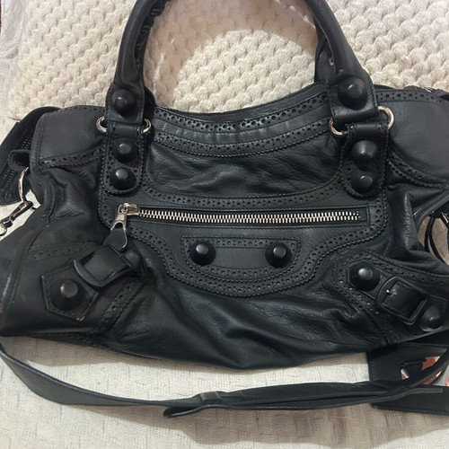 Balenciaga handbag used with long shoulder strap and company mirror
