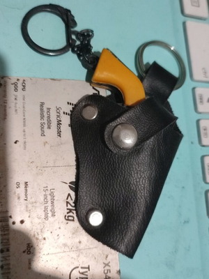 Miniature 1975 Minion Metal Keychain Gun like new