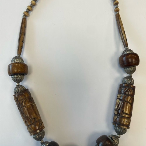 Long necklace with carved wooden and metal beads used, South Africa