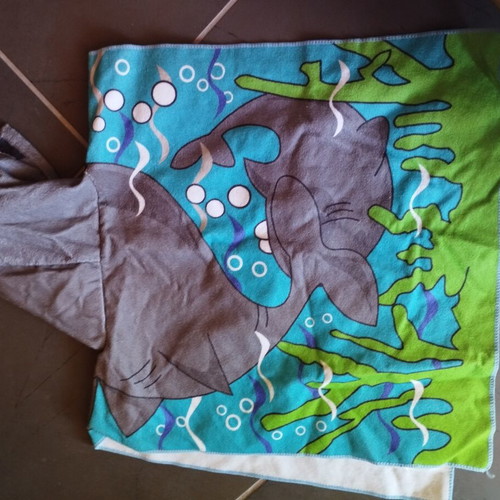 Children's beach poncho like new, one size