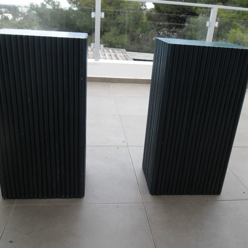 Console table used with 2 blue/navy bases and glass top