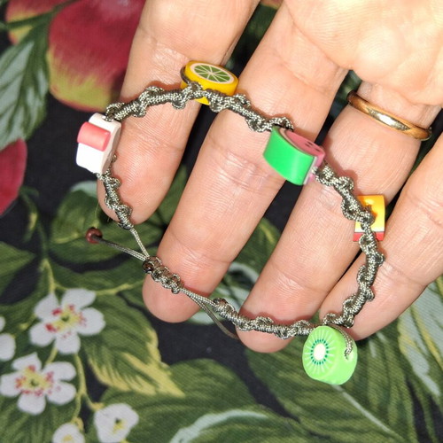 Macrame bracelet with decorative fruit beads