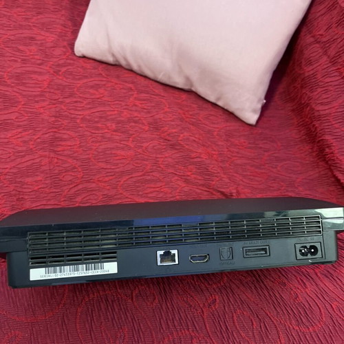 PlayStation 3 slim used, with two controllers
