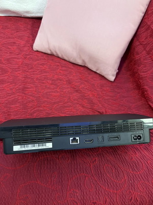 PlayStation 3 slim used, with two controllers