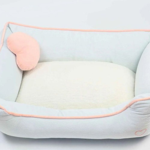 Dog bed new with heart-shaped pillow