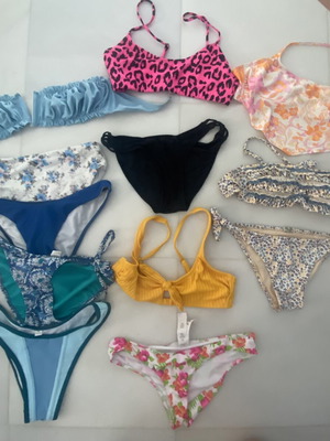 Swimsuits pack of 12 medium size like new, multicolor