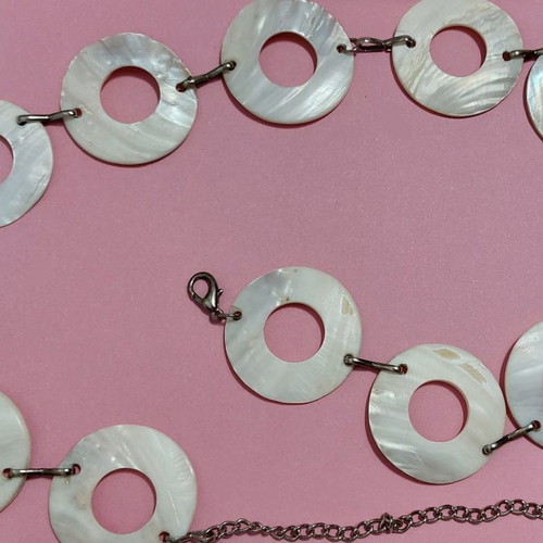 White belt with round circles used and metal links