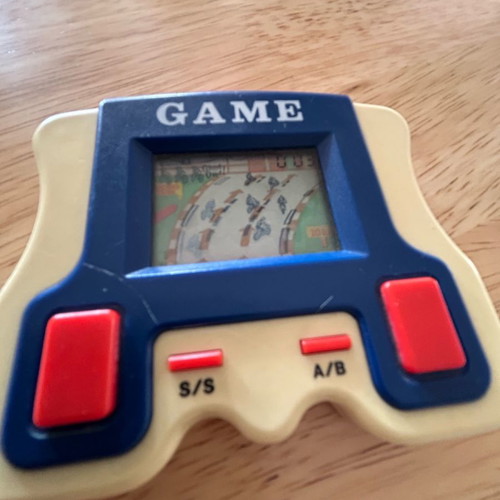Moto racing handheld game used, vintage 80s collectible